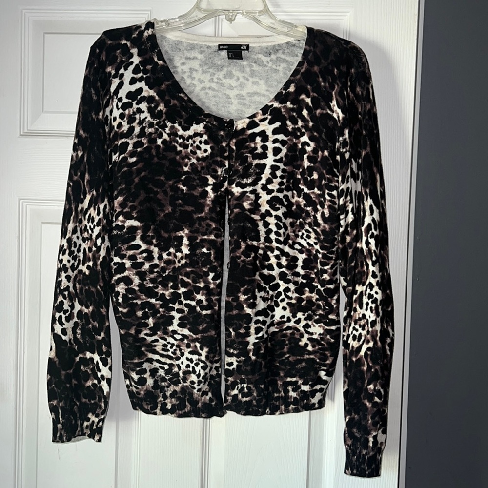 Brown, black and cream cardigan.